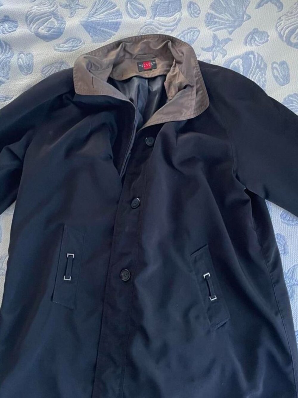 Gallery woman’s black trench jacket